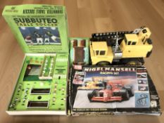 A Subbuteo set, a Tyco racing set, Tonka crane, etc.