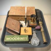 A lacquered brass telescope, a crystal atomiser with silver mount, treen boxes,
