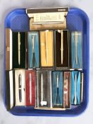 A collection of boxed ballpoint pens including Parker and Sheaffer