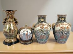 A pair of 20th century Japanese earthenware baluster vases, height 41 cm,
