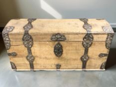 A 19th century continental pine and metal bound domed blanket chest,