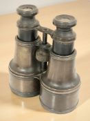 A pair of early 20th century brass binoculars by Whyte & Co. Glasgow.