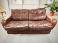 A Scandinavian Burgundy leather two seater settee,