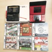 A Nintendo DS Lite, red case,