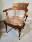 A continental carved beech open armchair, width 64 cm.