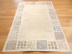 A machine made contemporary rug, 290 cm x 190 cm.