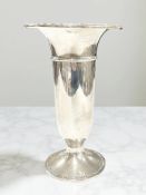 A loaded silver trumpet vase, Birmingham marks, height 20 cm.