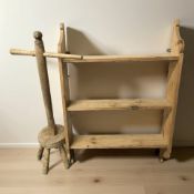A pine three tier wall shelf, width 66 cm, together with a poss stick.