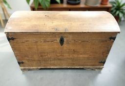 A 19th century continental pine and metal bound domed blanket chest, width 113 cm.