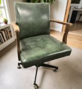 A 20th century green leather upholstered swivel desk armchair, width 61 cm.