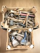 A quantity of vintage hammers, chisels and other tools.