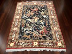 A machine made rug of Iranian design, 180 cm x 134 cm.