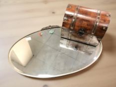 A 1920's chrome-framed bevelled mirror with hand-painted floral decoration, width 69cm,