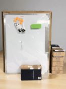 A group of white boards, marker pens,