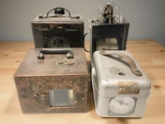 Four cased instruments including a Negretti & Zambra thermometer,