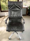 A Scandinavian swivel armchair