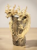 A contemporary Chinese wooden carving of dragons,
