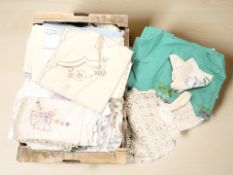 A quantity of vintage linen and similar goods.