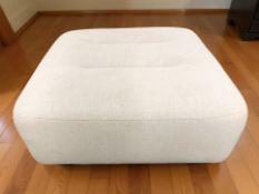 A contemporary square footstool, in grey upholstery, 92 cm x 92 cm x 42 cm.