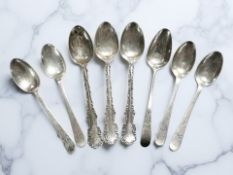 Eight various silver teaspoons. CONDITION REPORT: 85.5g.