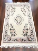 A Chinese floral woolen rug,
