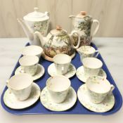 A fifteen piece Tams Ware Dorothy Art Deco coffee service, together with a Royal Doulton tea pot,