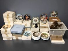 An extensive collection of ceramics collector's plates including editions by Royal Doulton,
