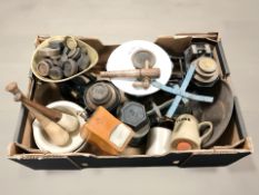 Several sets of scales, graduated brass and cast iron weights, mortars and pestles, kitchenalia.