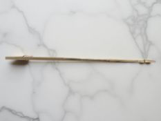 A 9ct gold telescopic propelling pencil, engraved with a rule in inch increments,