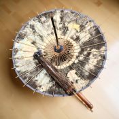 Two Oriental bamboo parasols