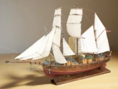 A hand built scale model three masted ship titled 'Meta', length 87 cm.