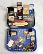 An engraved silver bangle, Birmingham 1970, together with a collection of costume jewellery,