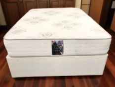 A 4ft 6 divan with Beauty Sleep Sorrento mattress.