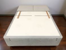 A 4ft 6 storage divan base with headboard.