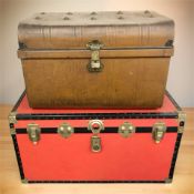 A canvas trunk, width 43 cm, and an early 20th century tin trunk.