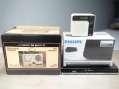 A group of boxed radios, Toshiba and Lodos DVD players, etc.