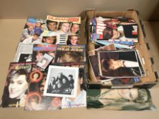 A collection of Duran Duran ephemera including various publications, photo cards, etc.