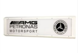 A reproduction enameled metal light up sign 'AMG Petronas Motorsport Mercedes Benz', 127 cm x 35 cm.
