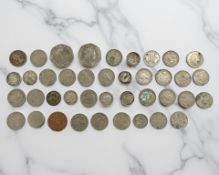 A group of coins to include Edward VII and George V silver three pences, 1940's- 1950's six pences,