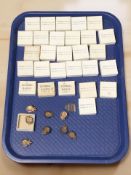 A collection of Civil Defense Corps enameled lapel badges.