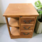 A reproduction book table, width 48 cm.