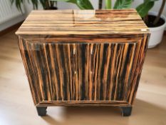 A contemporary high gloss rosewood effect double door low cabinet, 62 cm x 32 cm x 61 cm.