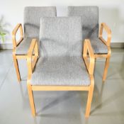 Three Scandinavian bentwood office armchairs in grey fabric