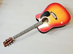 An Encore ENC165EAR electro acoustic guitar.