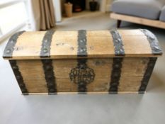 A 19th century continental pine and metal bound domed blanket chest,