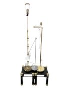 A pair of smoked glass lamp tables,