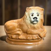 A Sadler Burslem figure of a recumbent lion