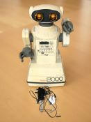A Tomy Omnibot 2000 computerised robot, with original instruction manual and charger.