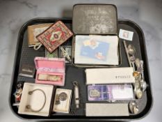 A tray of collectables including 'The EMCA' whistle, 1948 silver long service badge, torsion bangle,