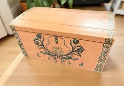 A Scandinavian painted pine domed blanket chest, bearing the date 1982, width 77 cm.